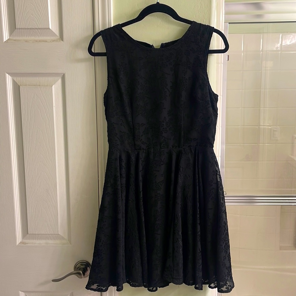 Black lace overlay sleeveless cocktail dress